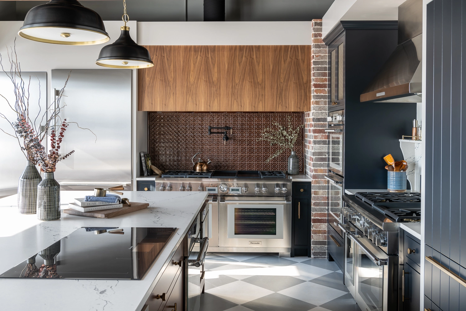 Modern kitchen design with large cooktop island