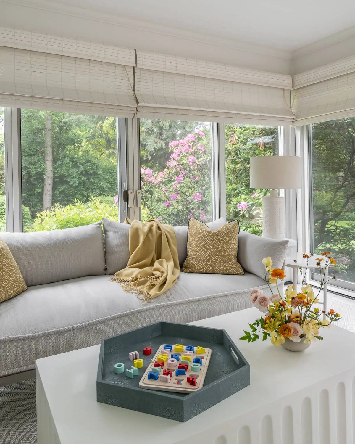 sunroom couch with yellow accents