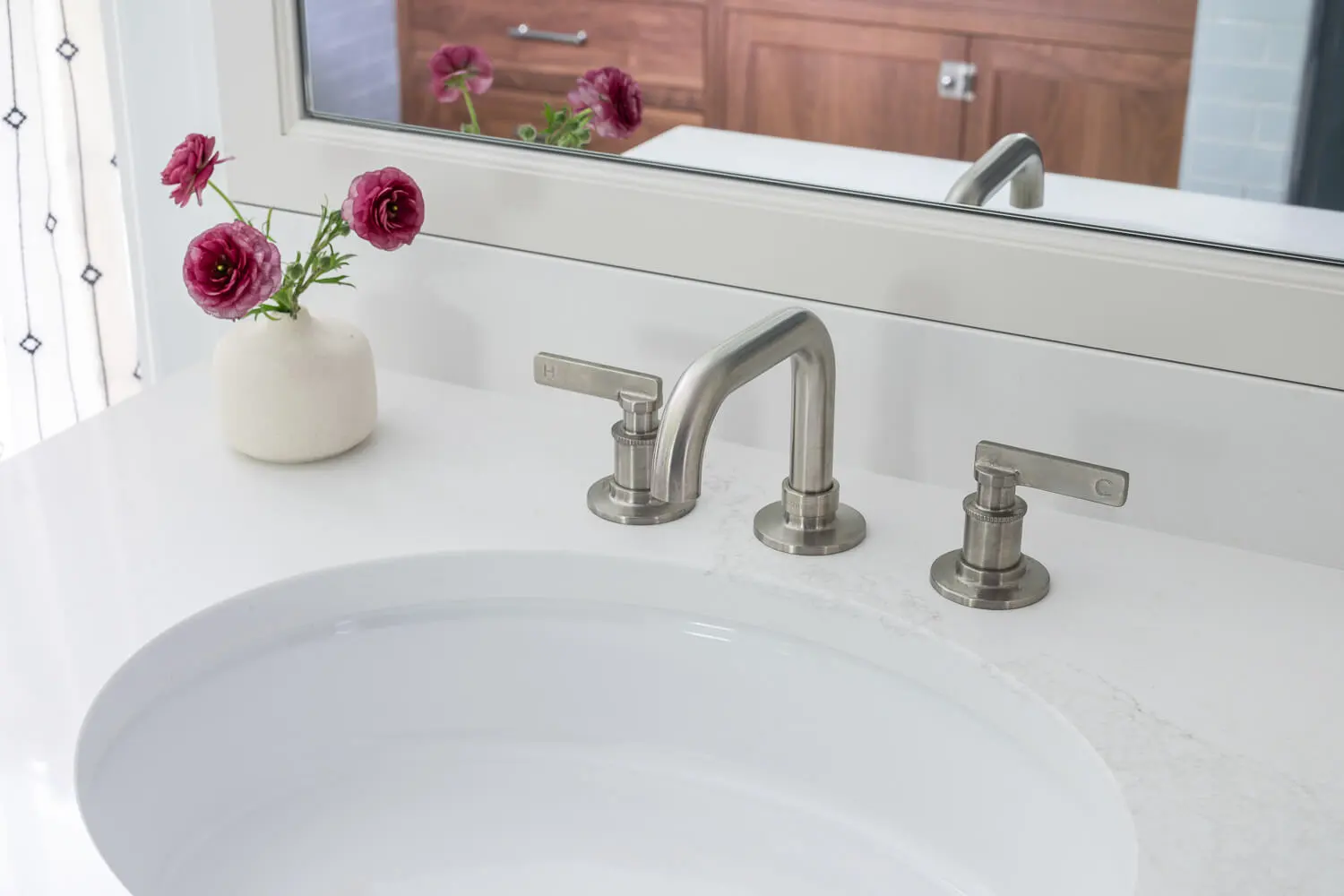 white countertops on custom bathroom vanity