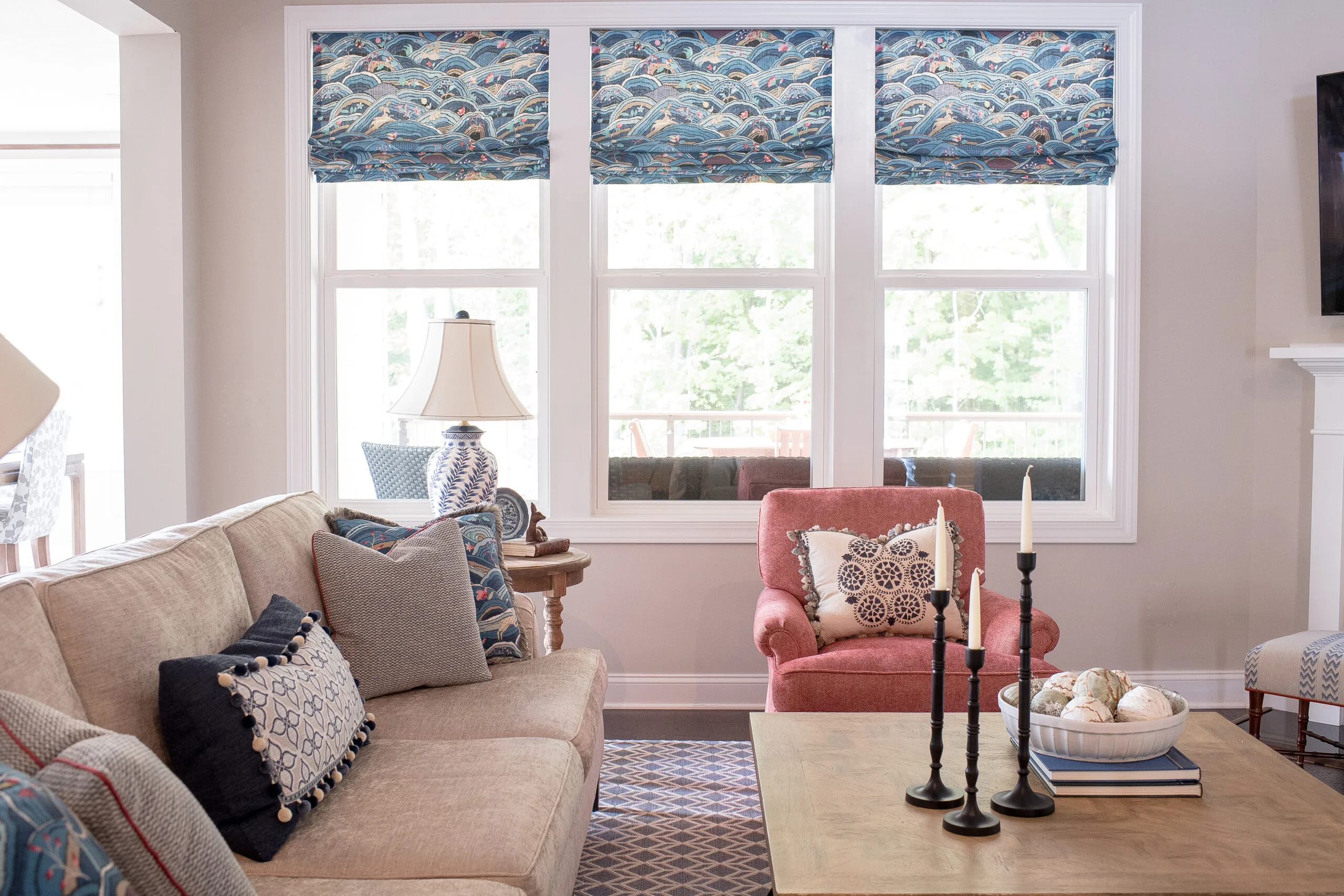 traditional living room design with soft orange and blue tones throughout furniture pieces