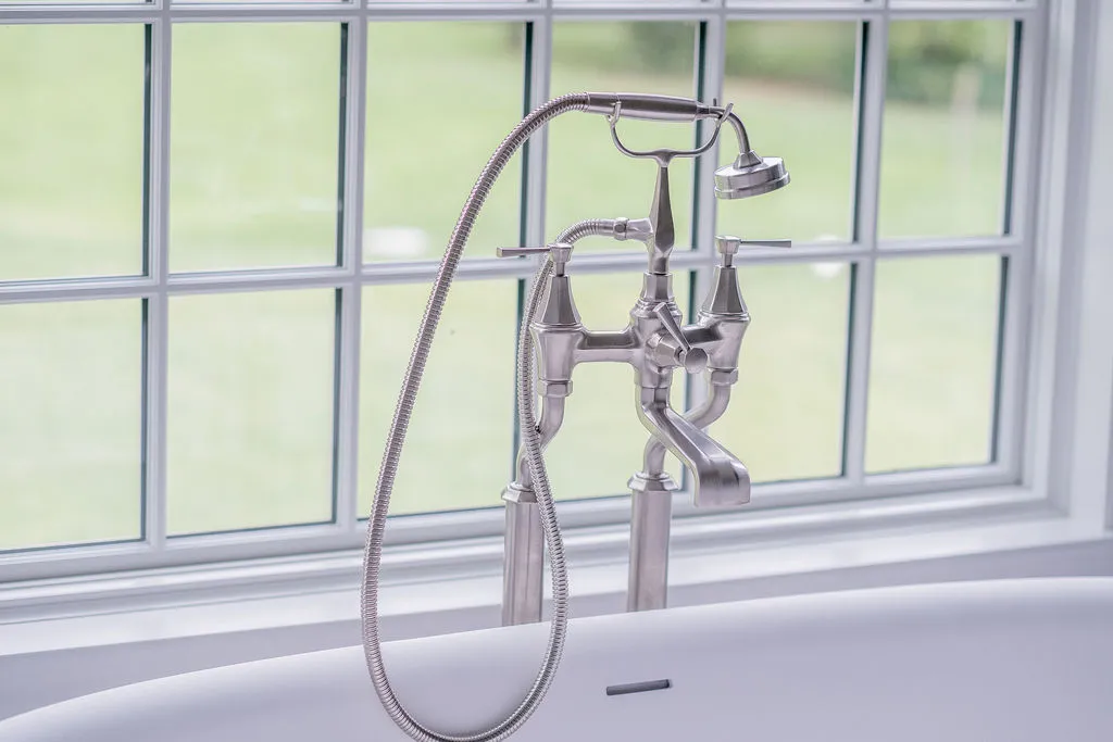 Nickel tub faucet on soaking tub