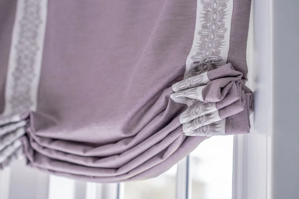 Purple drapery in bathroom