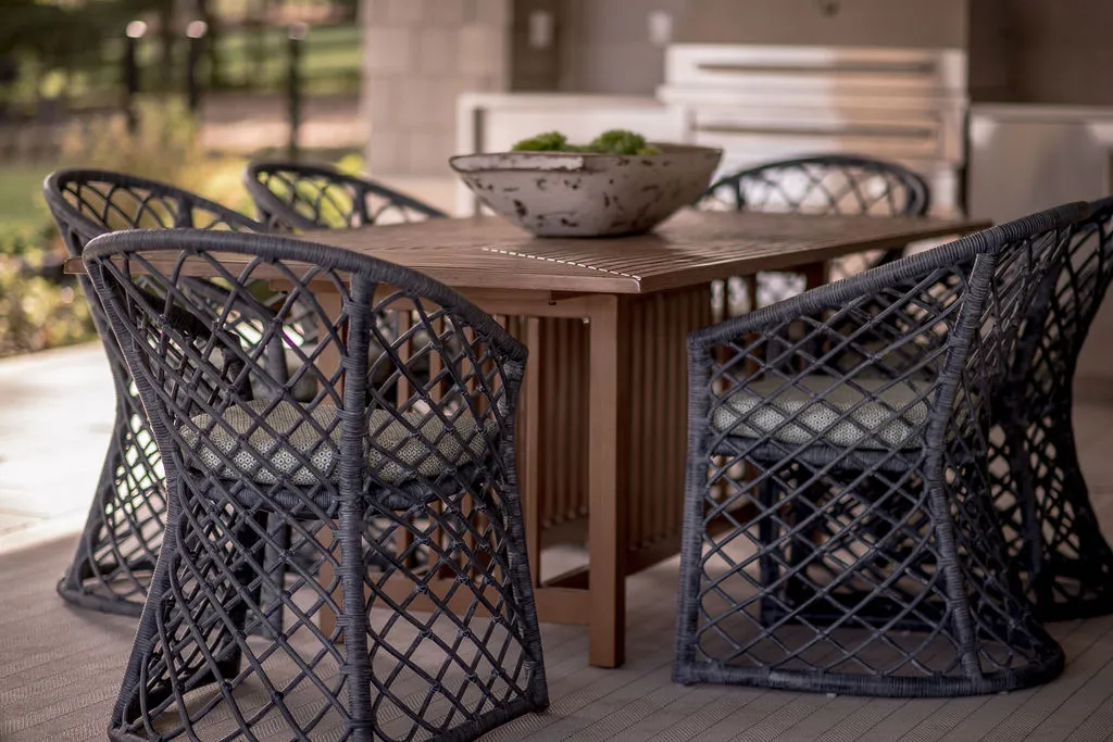 Outdoor dining table and navy chairs