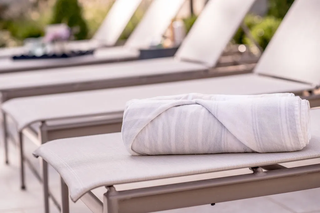 Pool side lounge chairs and towel