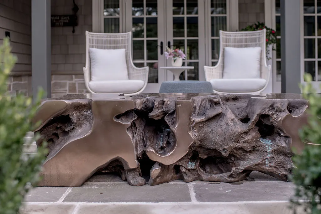 Outdoor area with tree ottomans