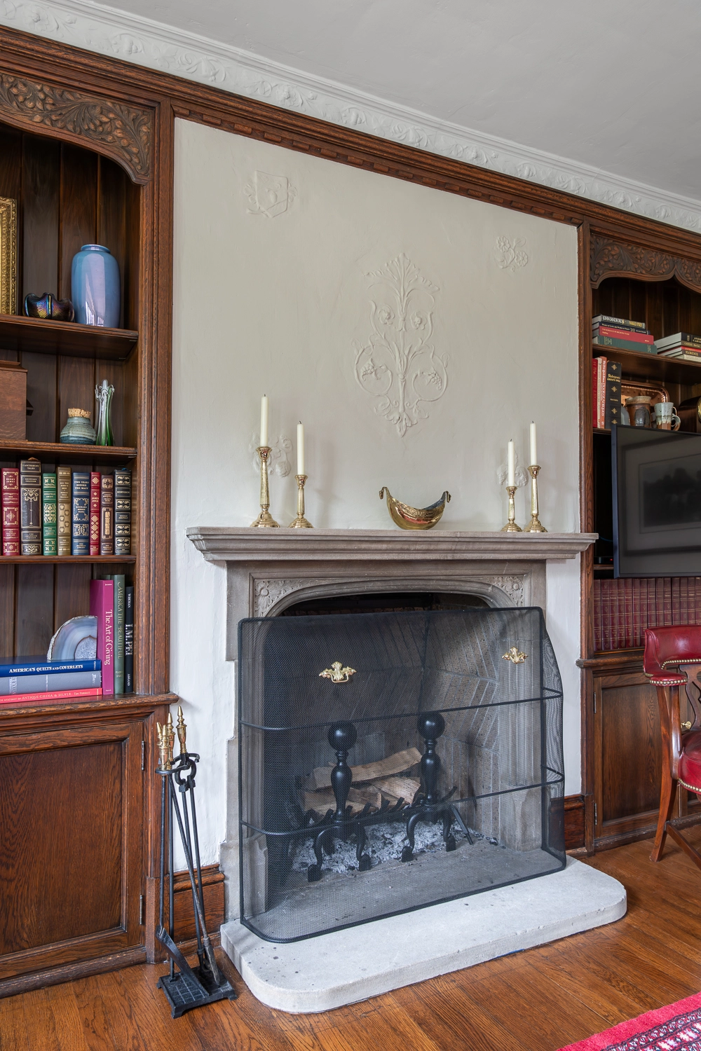 Fireplace with built-in bookcases on either side