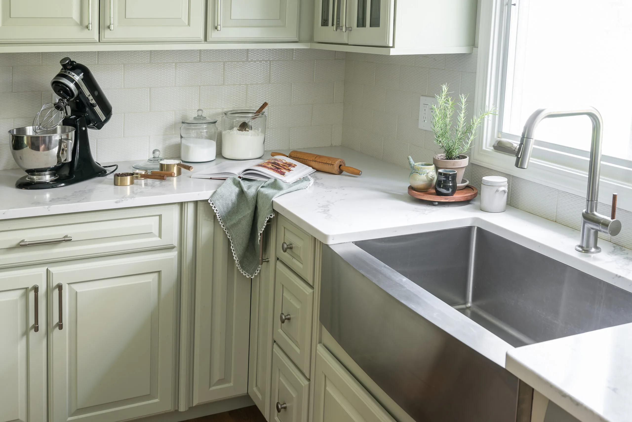Transitional kitchen with stainless apron front sink