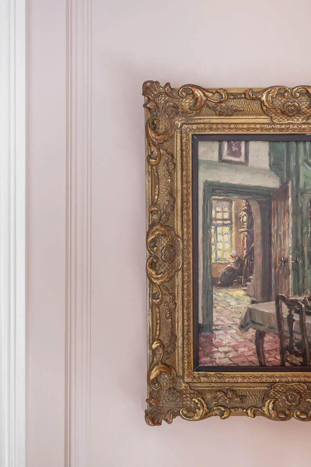 artwork with ornate golden frame