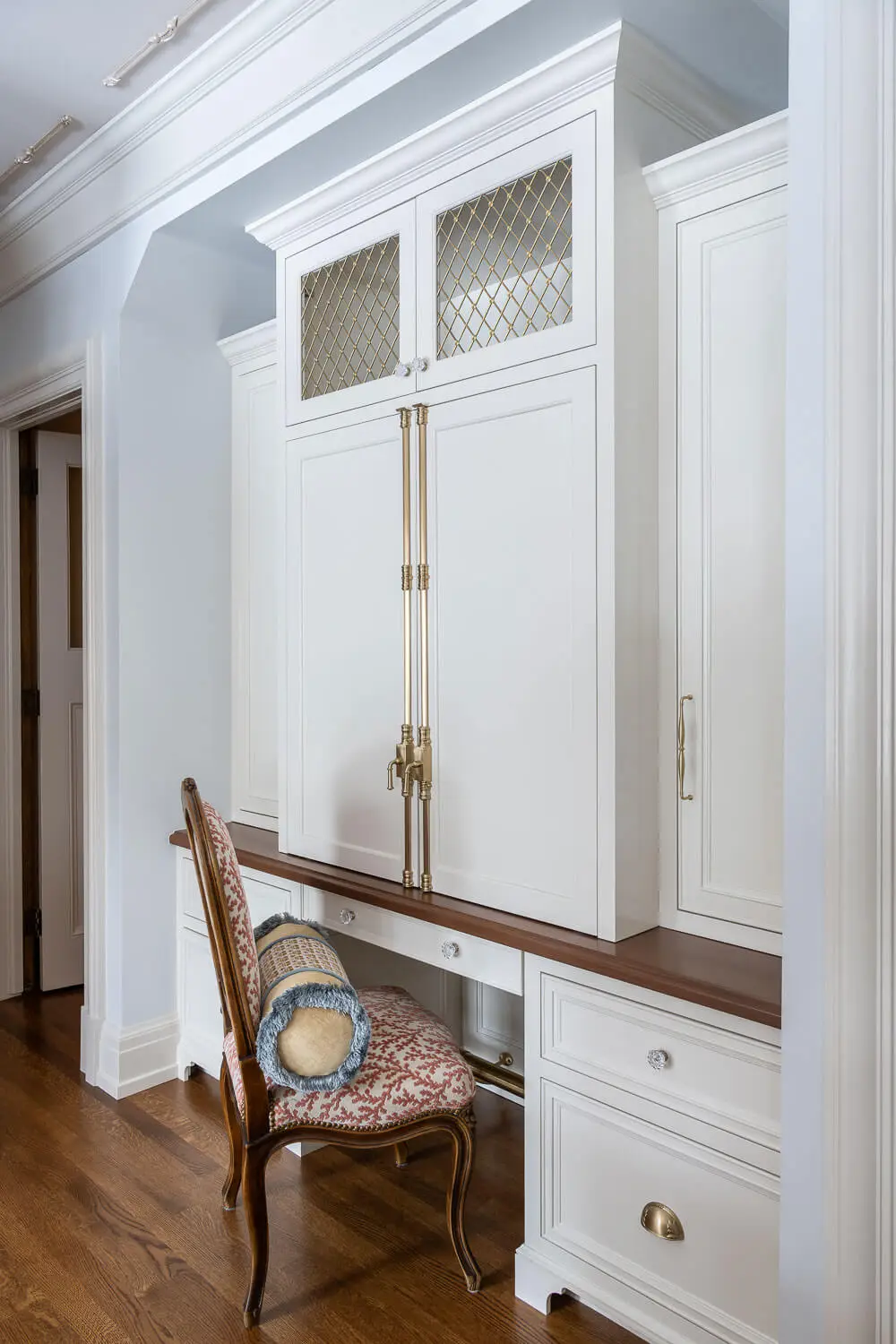 built-in desk alongside wall of kitchen