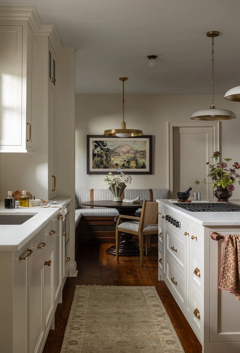 white kitchen cabinets and runner rug
